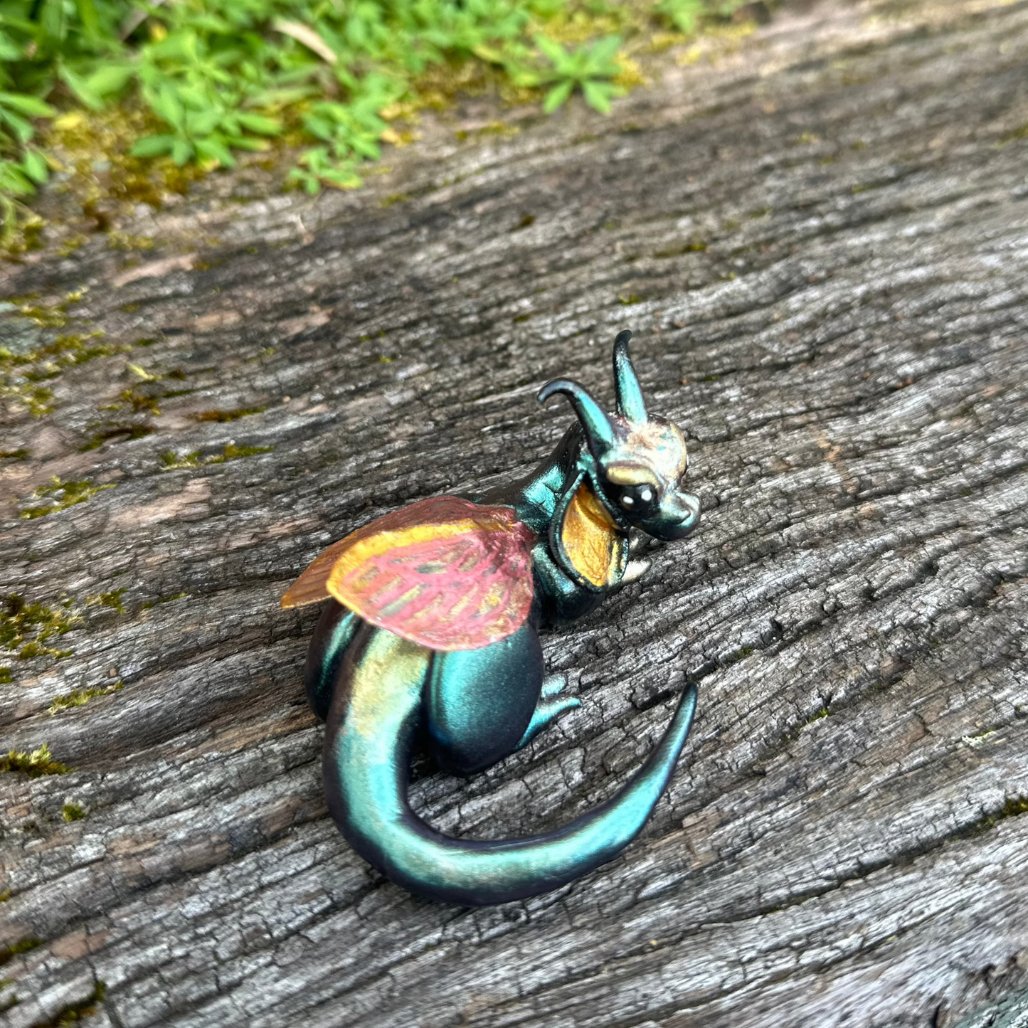 Palm-sized Iridescent Dragon